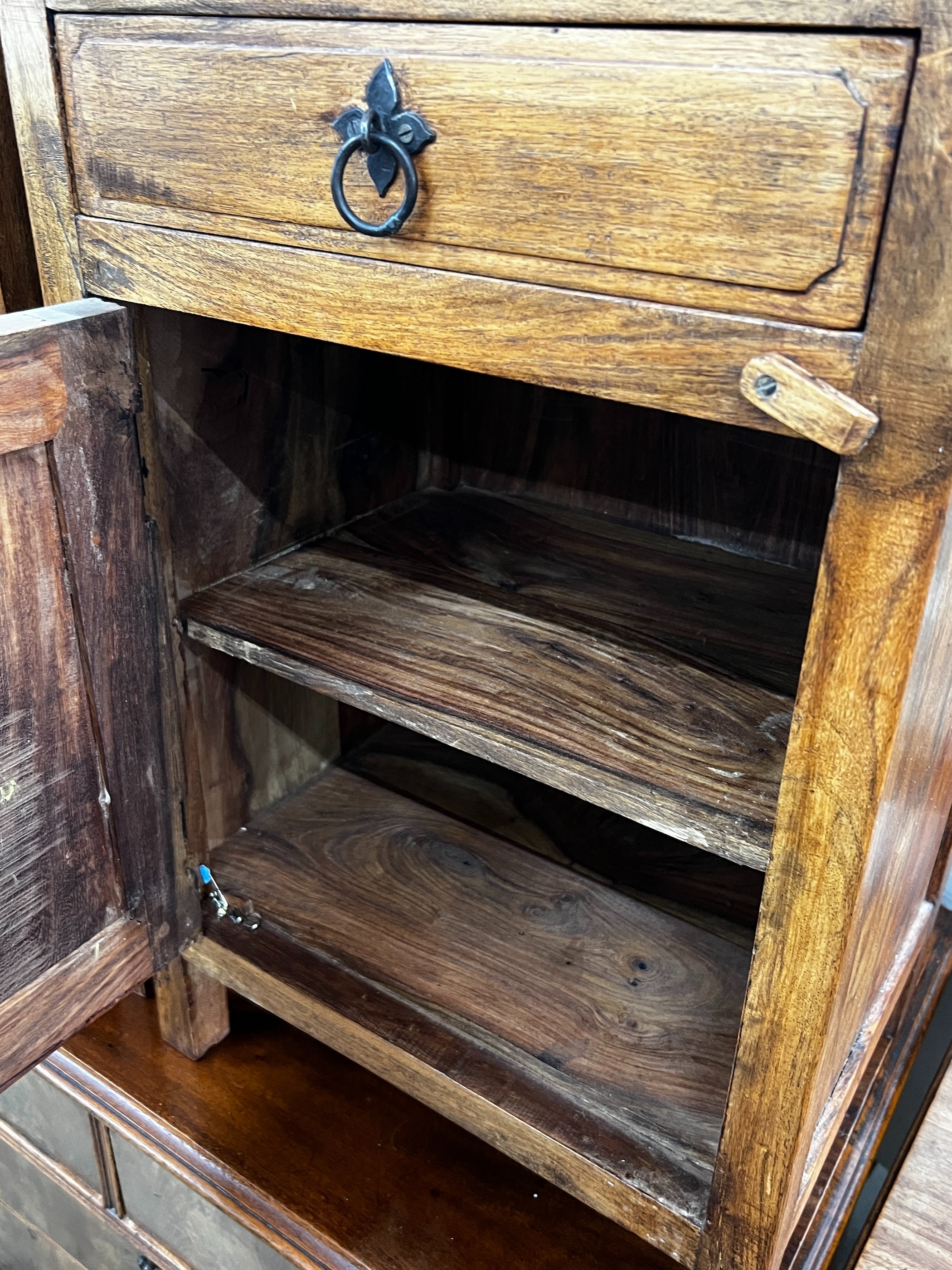 A pair of Indonesian hardwood bedside cabinets, width 43cm, depth 31cm, height 64cm